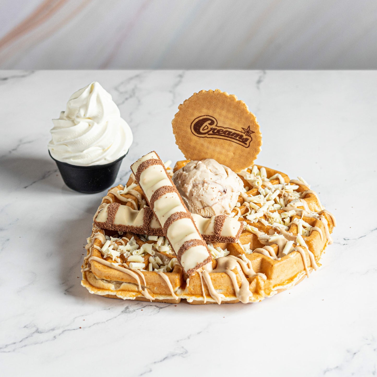 Dessert & Drink for 2 at Creams Cafe Blackburn (worth £25)